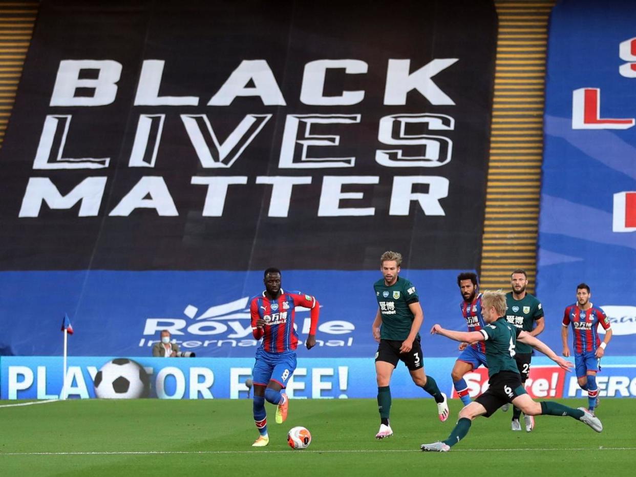 Crystal Palace display a Black Lives Matter banner against Burnley: Getty