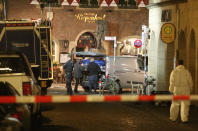 <p>A body is loaded into a vehicle in front of a restaurant in Muenster, Germany, Sunday, April 8, 2018 after a vehicle crashed into a crowd. (Photo: David Young/dpa via AP) </p>