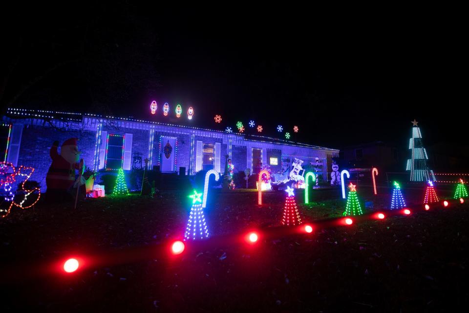 A house decorated for Christmas on Woodgate Way in Tallahassee, Fla. as seen on Thursday, Dec. 9, 2022. 