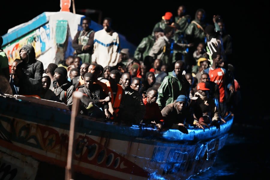 Migrants crowd a wooden boat as they are towed to the port in La Restinga on the Canary island of El Hierro on Saturday, Nov. 4, 2023. More than 32,000 migrants have landed in Spain’s Canary Islands this year setting a new record for the number of irregular arrivals to the archipelago. Most migrants taking the dangerous Atlantic boat journey are leaving from Senegal. (Humberto Bilbao/Europa Press via AP)