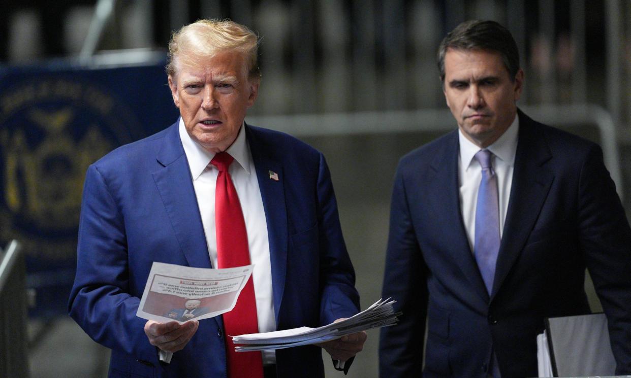 <span>Donald Trump with attorney Todd Blanche at Manhattan criminal court in New York on 10 May. </span><span>Photograph: Getty Images</span>