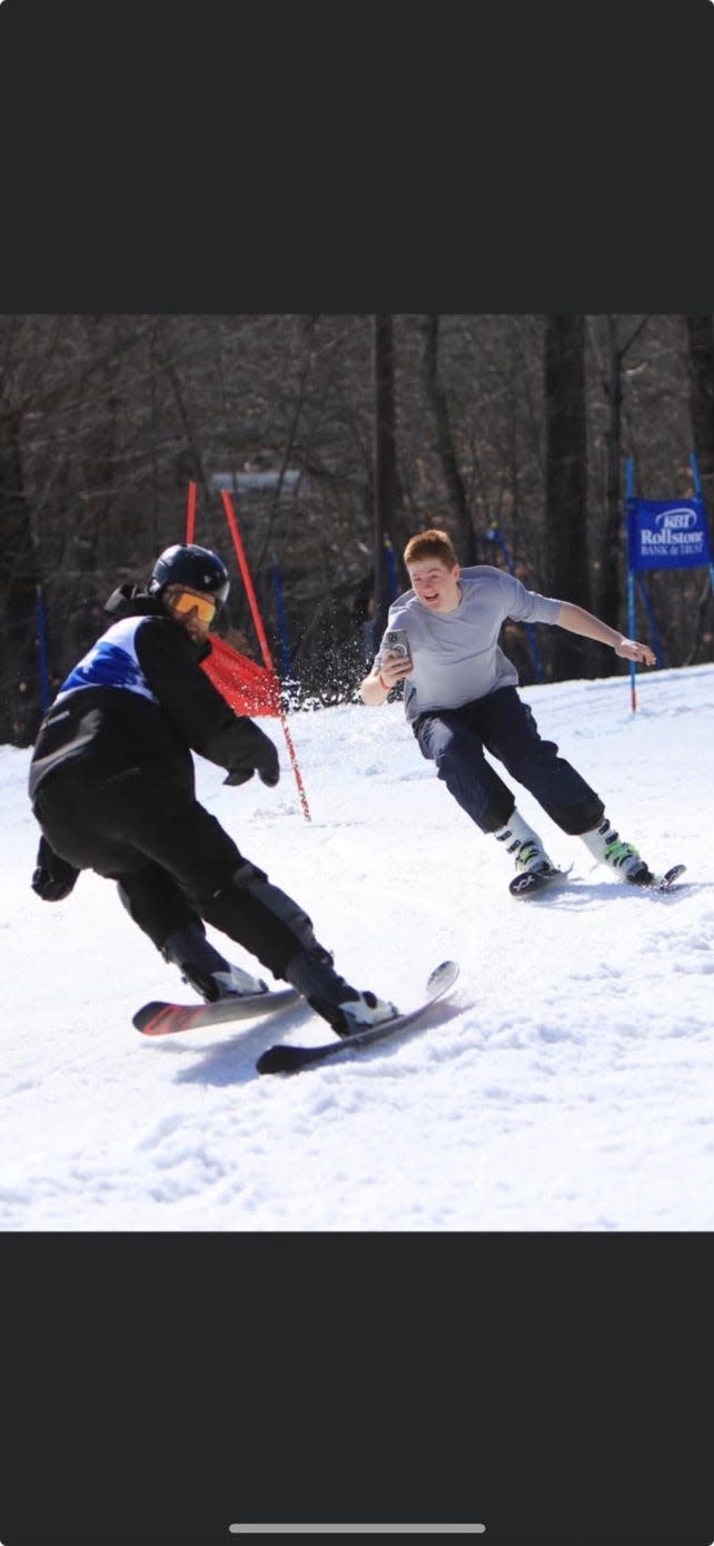 Luke Hanlon of Worcester, left, skis the Good Race backward last week at Wachusett.