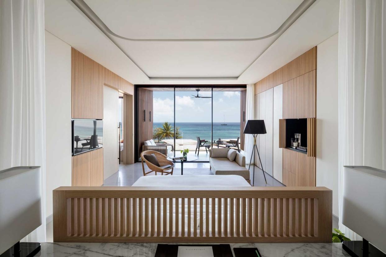 View from inside a modern hotel room out to the ocean, at the Silversands Grenada hotel