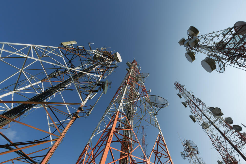 Cell towers viewed from below.