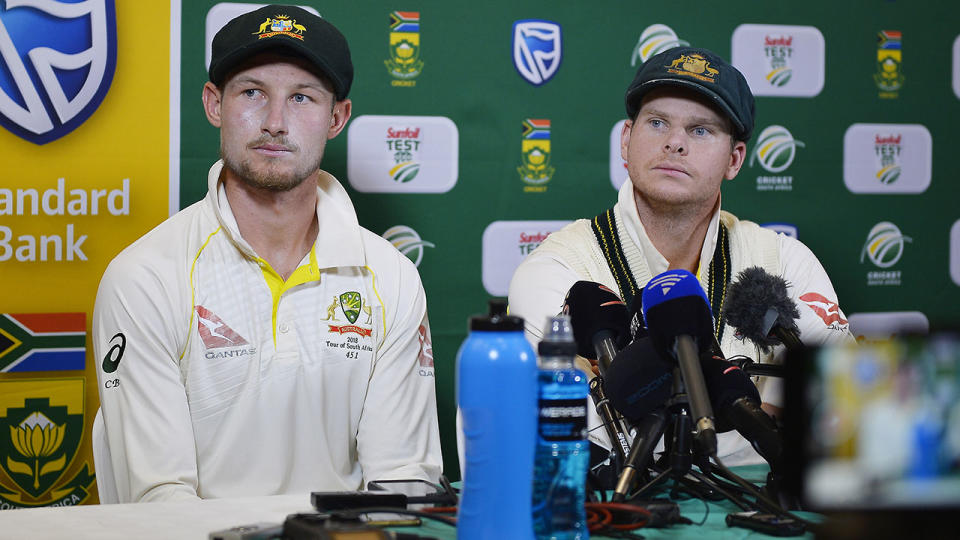 Steve Smith and Cameron Bancroft address the media after the scandal broke. (Photo by Ashley Vlotman/Gallo Images/Getty Images)