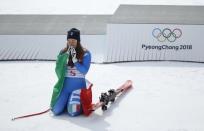 Alpine Skiing - Pyeongchang 2018 Winter Olympics - Women's Downhill - Jeongseon Alpine Centre - Pyeongchang, South Korea - February 21, 2018 - Sofia Goggia of Italy reacts during the victory ceremony. REUTERS/Mike Segar