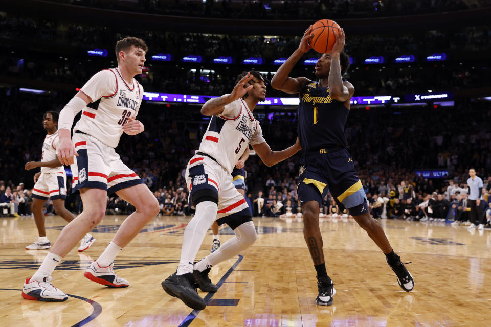 Marquette and UConn face off in the Big East Basketball Tournament Final at Madison Square Garden.