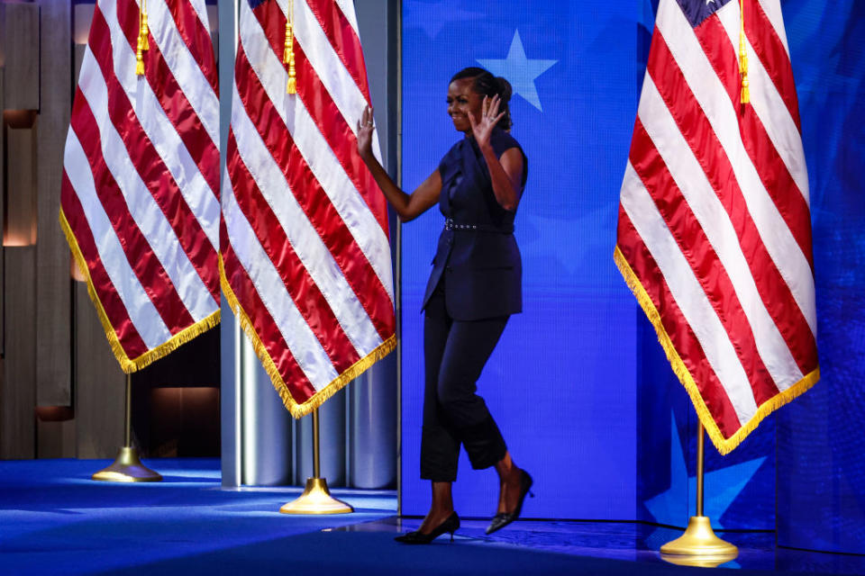 CHICAGO, ILLINOIS - AUGUST 20: Former first lady Michelle Obama arrives on stage to speak during the second day of the Democratic National Convention at the United Center on August 20, 2024 in Chicago, Illinois. Delegates, politicians and supporters of the Democratic Party are gathering in Chicago, as current Vice President Kamala Harris has been named as her party's presidential nominee. The DNC takes place from August 19-22. (Photo by Chip Somodevilla/Getty Images)