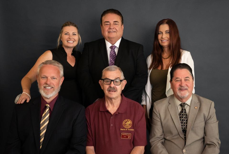 Top row, left to right, Victor Valley College Trustee Jennifer Tarpley, President Daniel Walden and Trustee Sharon Pinkerton. Bottom row, left to right, Trustee Brandon Wood, the late Trustee Dennis Henderson and Trustee Joseph W. Brady.