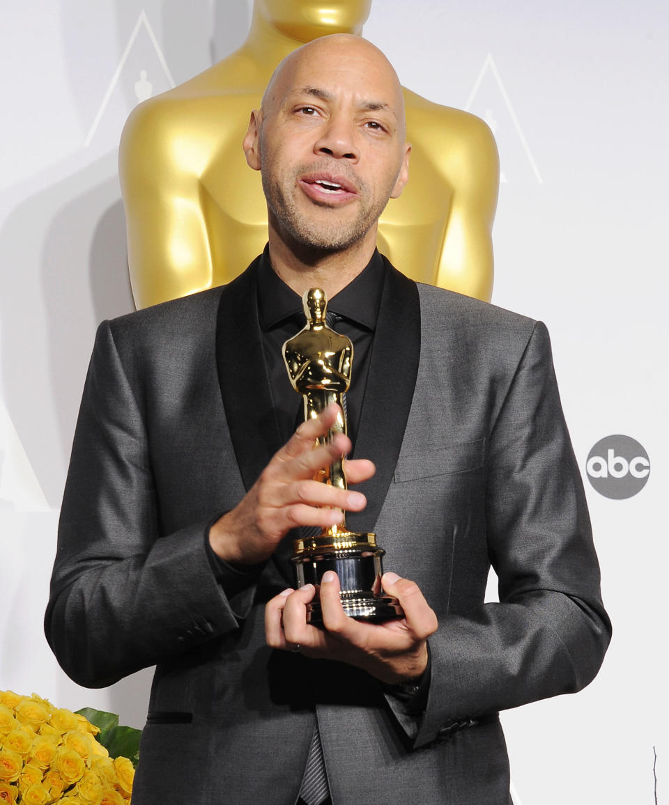 HOLLYWOOD, CA- MARCH 02: Screenwriter John Ridley, winner of Best Writing, Screenplay Based on Material Previously Produced or Published for '12 Years A Slave' poses in the press room during the 86th Annual Academy Awards at Loews Hollywood Hotel on March 2, 2014 in Hollywood, California.(Photo by Jeffrey Mayer/WireImage)