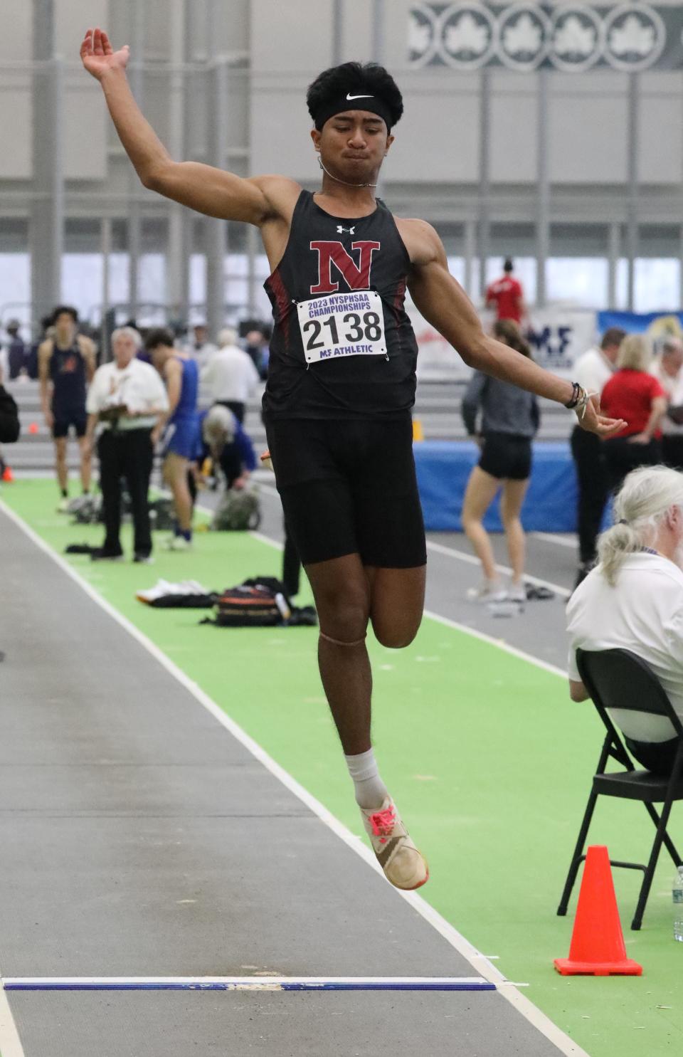Nyack's Putu Sutayasa competes in the boys long jump  during the New York State Indoor Track and Field Championships, at the Ocean Breeze Athletic Complex on Staten Island, March 4, 2023. 