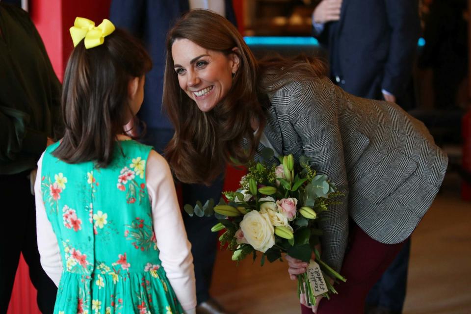 Catherine, Duchess of Cambridge is presented with flowers from Michaela Conway (Getty Images)