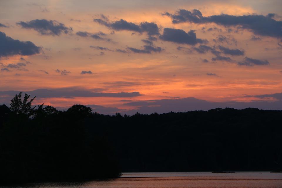 Sunset over Olney Pond at Lincoln Woods State Park.