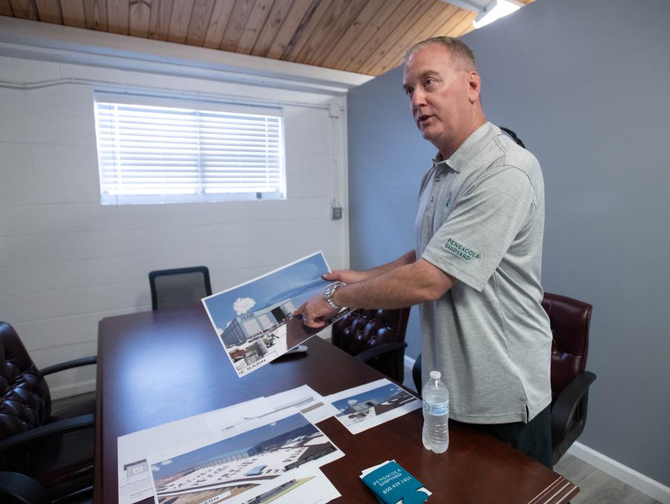 Owner David Finkelstein shows renderings of the dry storage barn being built at the Pensacola Shipyard along Bayou Chico in Pensacola on Friday, July 14, 2023.  The building will be 190 feet wide by 630 feet long by 60 to 70 feet high.