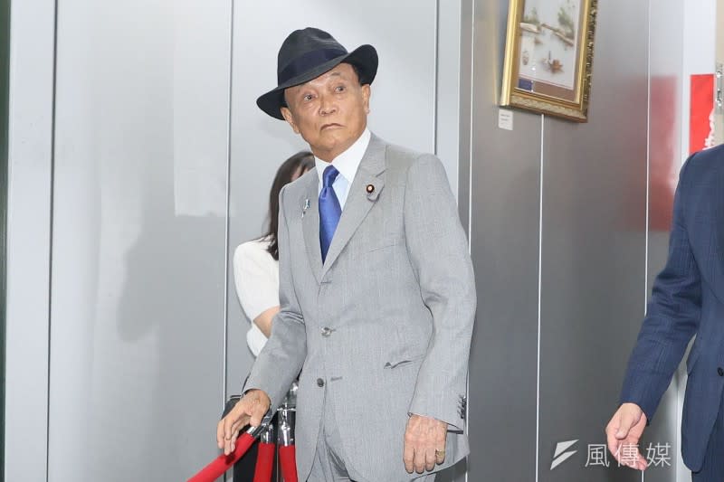 <cite>松田康博指出，日本前首相麻生太郎的決策在黨內引發反感。（資料照，柯承惠攝）</cite>