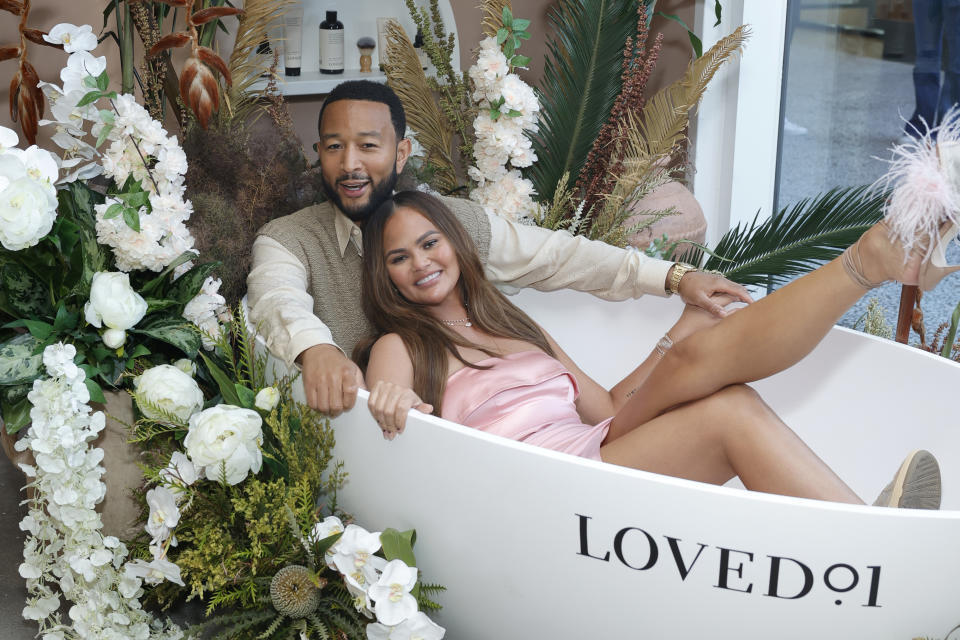 LOS ANGELES, CALIFORNIA - JULY 20: (L-R) John Legend and Chrissy Teigen attend LOVED01 By John Legend Launches Pop-Up At at Westfield Century City on July 20, 2023 in Los Angeles, California. (Photo by Stefanie Keenan/Getty Images for LOVED01)