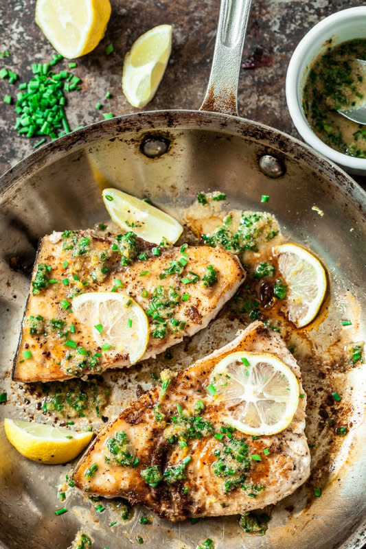 <p>Chew Out Loud</p><p>This buttery lemon garlic swordfish is stunningly delicious. This recipe results in a tender, flavor-packed fish that tastes like you spent way more time on it than you did.</p><p><strong>Get the recipe: <a href="https://www.chewoutloud.com/lemon-garlic-swordfish-recipe/" rel="nofollow noopener" target="_blank" data-ylk="slk:Lemon Garlic Swordfish;elm:context_link;itc:0;sec:content-canvas" class="link rapid-noclick-resp">Lemon Garlic Swordfish</a></strong></p>