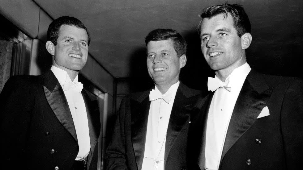 Sen. John F. Kennedy, center, D-Mass., and his brothers Edward Kennedy, left, a student at the University of Virginia, and Robert F. Kennedy, chief counsel to the Senate Rackets Committee, attend the annual Gridiron Club dinner