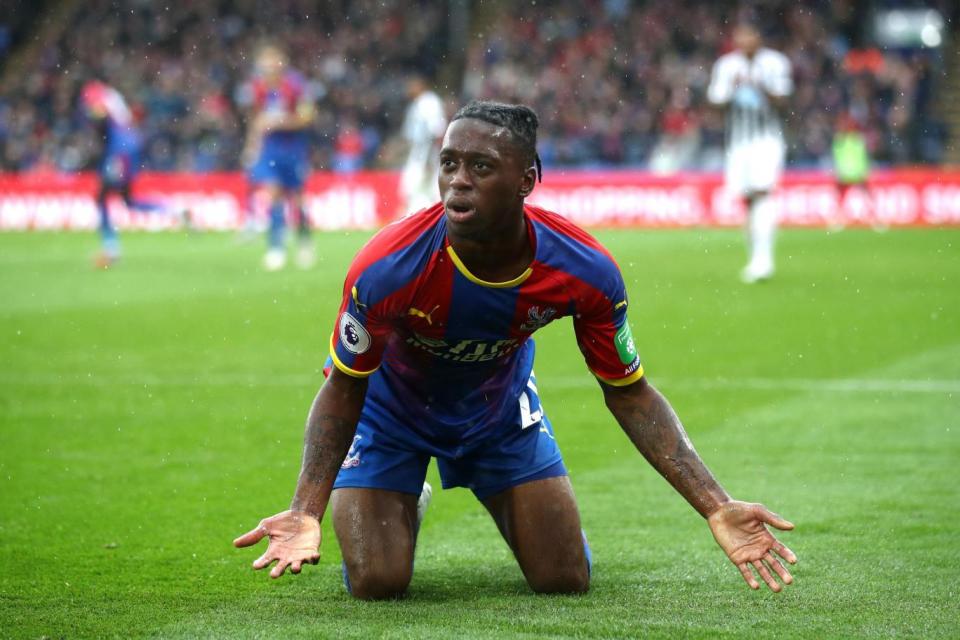 Wan-Bissaka appeared to be struck by a bottle. Getty Images)