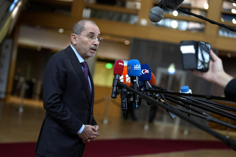 Jordan's Foreign Minister Ayman Safadi speaks with the media as he arrives for a meeting of EU foreign ministers at the European Council building in Brussels, Monday, Jan. 22, 2024. European Union Foreign Affairs Ministers meet in Brussels on Monday to discuss the situation in the Middle East and in Ukraine. (AP Photo/Virginia Mayo)