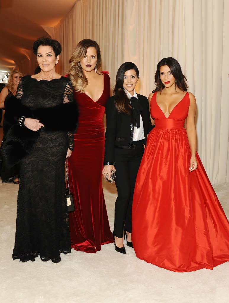 Kris Jenner shared a throwback holiday photo of the Kardashian sisters to usher in December. (Photo: Getty)