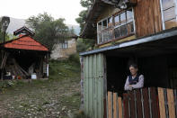 <p>Vida, the last woman living in the village of Ravno Bucje, stands in front of her home, near the south-eastern town of Knjazevac, Serbia, August 15, 2016. Her husband Bosko died last year and although it is very remote and has hard winters, she wants to stay in the village. Her daughter lives in Knjazevac and brings Vida things she need once a month. She lives in the village with a dog and two cats. REUTERS/Marko Djurica SEARCH “DEPOPULATION” FOR THIS STORY. SEARCH “WIDER IMAGE” FOR ALL STORIES. – RTS1CYDX </p>