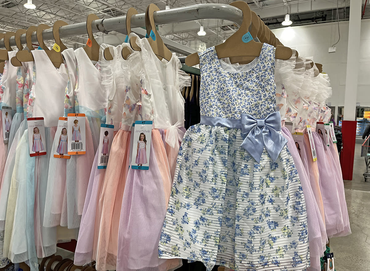 Jona Michelle Kids' Spring Dresses on display in a Costco warehouse