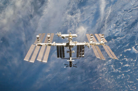 FILE PHOTO - The International Space Station is seen in this view from the space shuttle Discovery after the undocking of the two spacecraft in this photo provided by NASA and taken March 7, 2011. Courtesy NASA/Handout via REUTERS