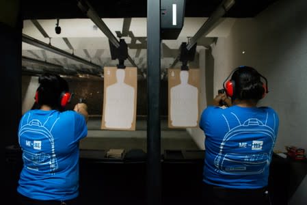 Pair practice shooting at a gun range in El Paso