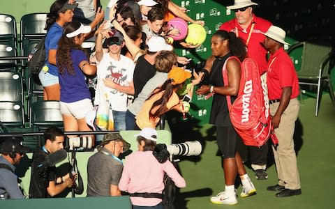 Serena Williams signs autographs - Credit: Getty Images