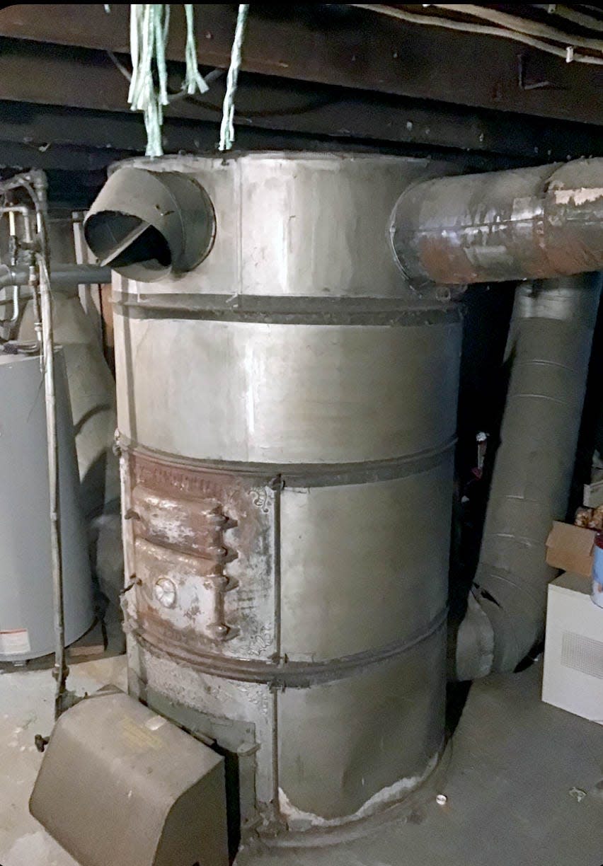 Brenda Deeter's old furnace dated back to 1907 and weighed about 300 pounds.