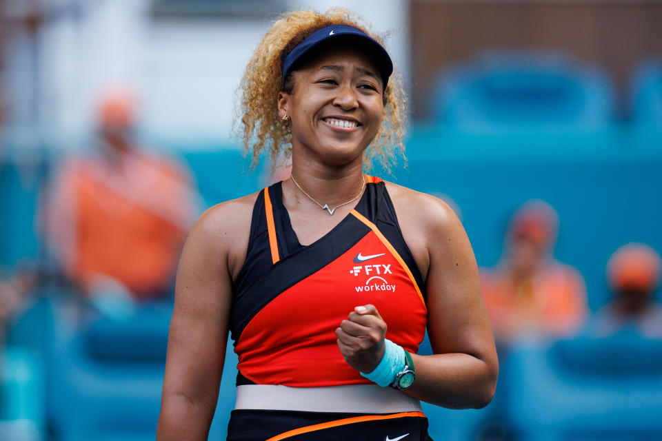 Naomi Osaka (pictured) smiles after her Miami Open match.