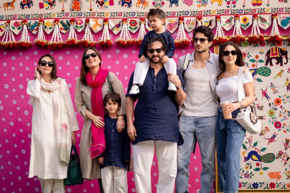 A-list celebrities like Bollywood actor Saif Ali Khan (C) with his wife and actress Kareena Kapoor Khan (2L) attending the wedding celebrations. Reliance/AFP via Getty Images