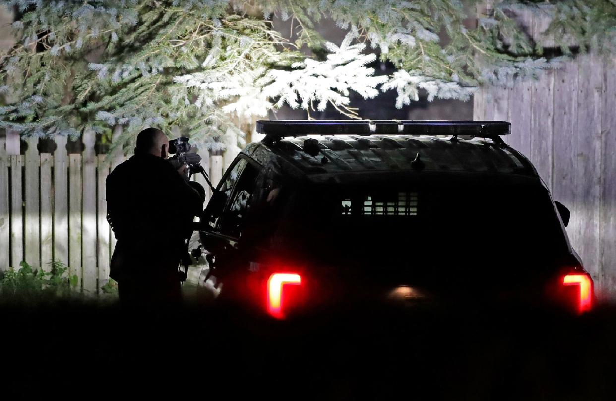 A heavy police presence, including multiple jurisdictions and a SWAT team, is outside a Frances Street duplex Tuesday night.