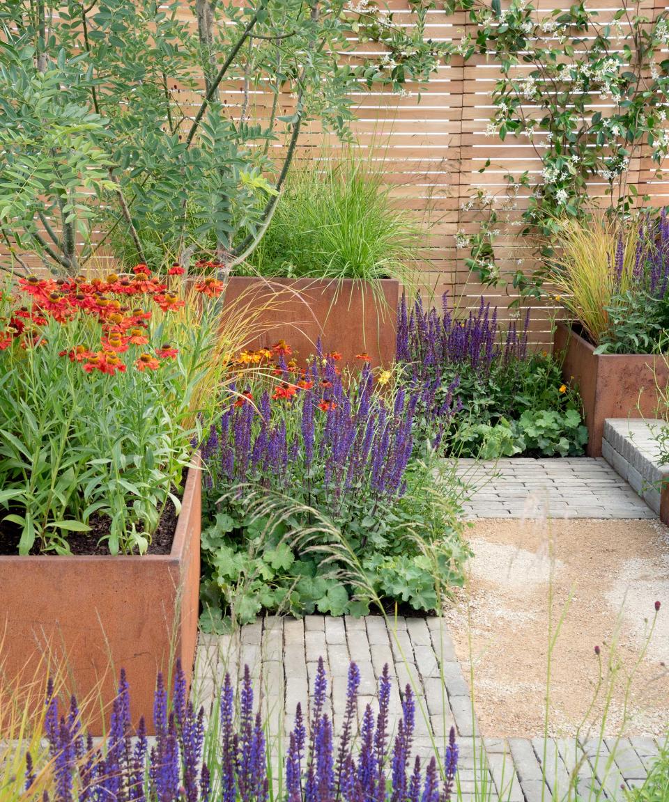 Corten steel containers on small patio