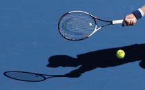 Tennis - Australian Open - Margaret Court Arena, Melbourne, Australia, January 16, 2018. Novak Djokovic of Serbia hits a shot against Donald Young of the U.S. REUTERS/Issei Kato