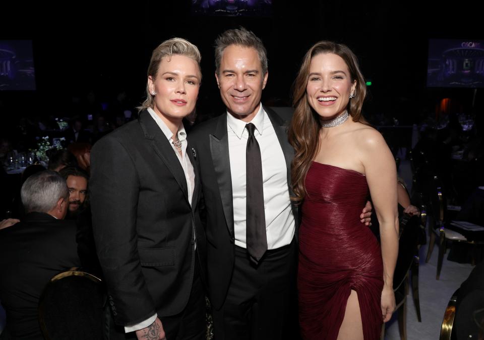 Ashlyn Harris, Eric McCormack, and Sophia Bush attend the Elton John AIDS Foundation's 32nd Annual Academy Awards Viewing Party on March 10, 2024 in West Hollywood, California.