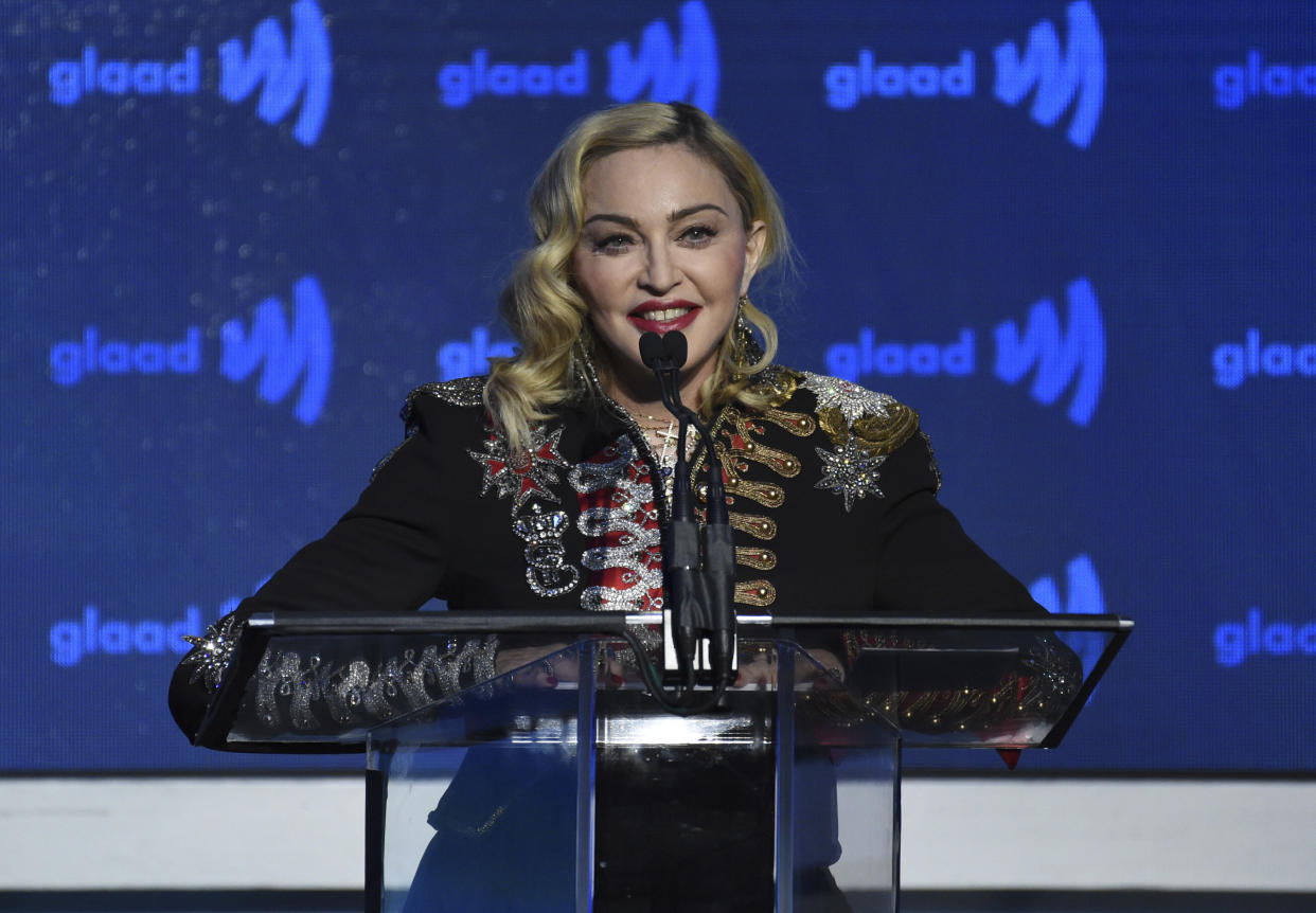 FILE - In this May 4, 2019 file photo,  Madonna accepts the advocate for change award at the 30th annual GLAAD Media Awards at the New York Hilton Midtown in New York. The 13-track “Madame X,” Madge's first LP since the underappreciated 2015’s “Rebel Heart,” sees her predictably collaborate with the hot young things of pop, Swae Lee, Anitta, Quavo, Maluma, with results that are fine, but boring. It seems more like a checklist than the spark of partnership.  (Photo by Evan Agostini/Invision/AP)