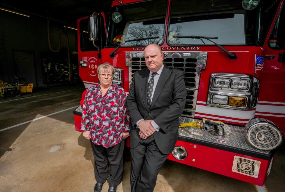 Cynthia Fagan-Perry, president of the board of directors for the Central Coventry Fire District, with David D'Agostino, the district's lawyer.