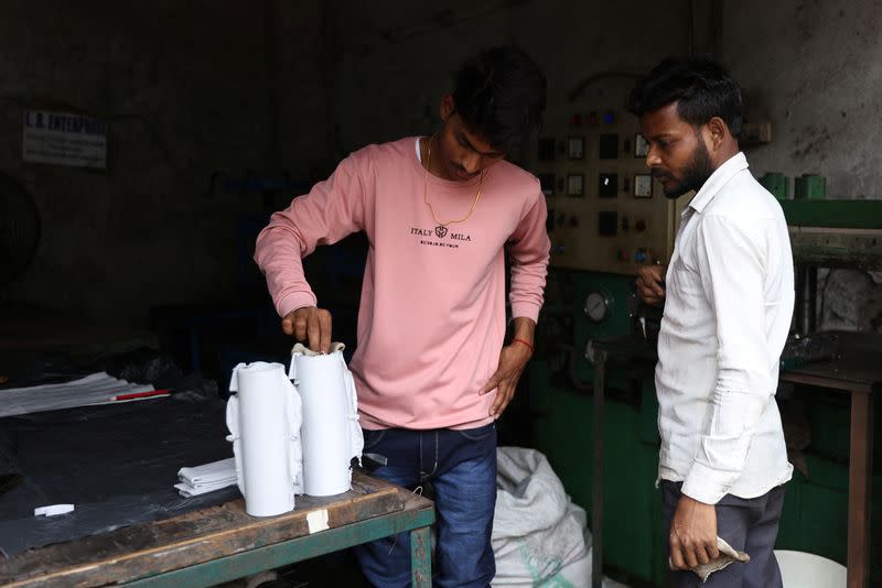 21-year-old aspiring college student and migrant worker Sujeet Kumar works at his brother-in-law Sunil Kumar's factory which manufactures rubber sealants for pressure cookers, on the outskirts of Mumbai,