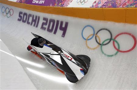 Pilot Steven Holcomb of the U.S. speeds down the track during a two-man bobsleigh training session at the Sanki Sliding Center in Rosa Khutor at the Sochi 2014 Winter Olympics February 15, 2014. REUTERS/Murad Sezer