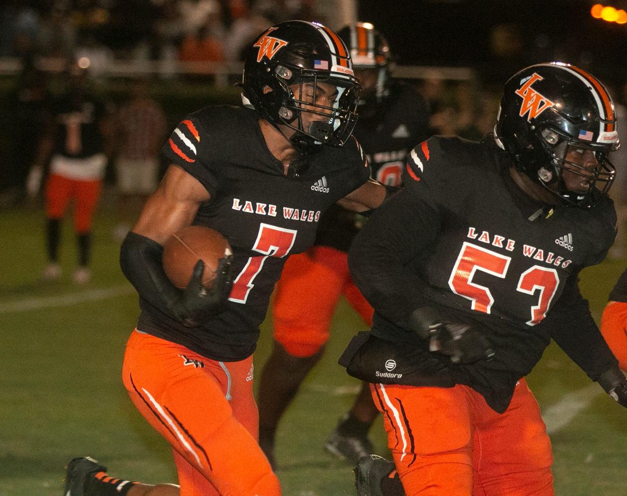 Lake Wales High School running back Corey Harris Jr. (7) rushes the ball against Columbia High School during their FHSAA 3S State Semifinal game in Lake Wales Friday night. December 2, 2022.