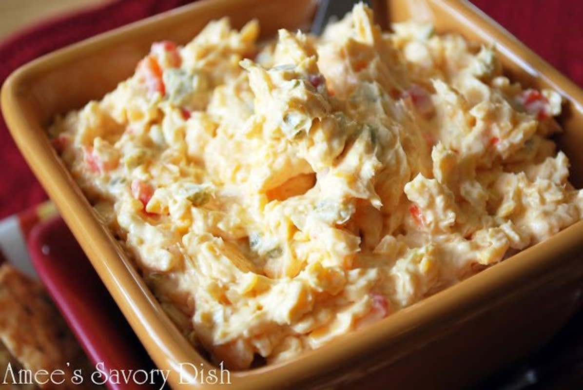 <p>Amee's Savory Dish</p><p>Add some kick to the favorite Southern cheese spread. <a href="http://ameessavorydish.com/southern-style-jalapeno-pimento-cheese/" rel="nofollow noopener" target="_blank" data-ylk="slk:Get the recipe HERE!;elm:context_link;itc:0;sec:content-canvas" class="link rapid-noclick-resp">Get the recipe HERE!</a></p>