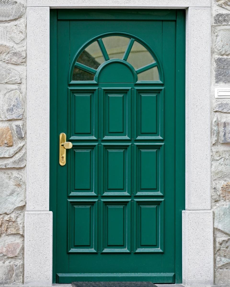 Deep Green front door, isolated without a house