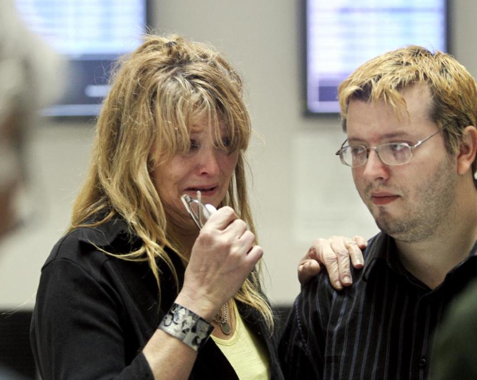 Jill Robinson, left, leans on the shoulder of her oldest son John, at the Anoka County Courthouse, Thursday, March 22, 2012, in Anoka, Minn. Robinson's son Trevor died after taking the synthetic drug, supplied by Timothy LaMere. Twenty-two-year-old Timothy LaMere pleaded guilty Thursday in Anoka County he'll receive nine years, nine months in prison when he's sentenced May 25. (AP Photo/The Star Tribune, David Joles) MANDATORY CREDIT; ST. PAUL PIONEER PRESS OUT; MAGS OUT; TWIN CITIES TV OUT