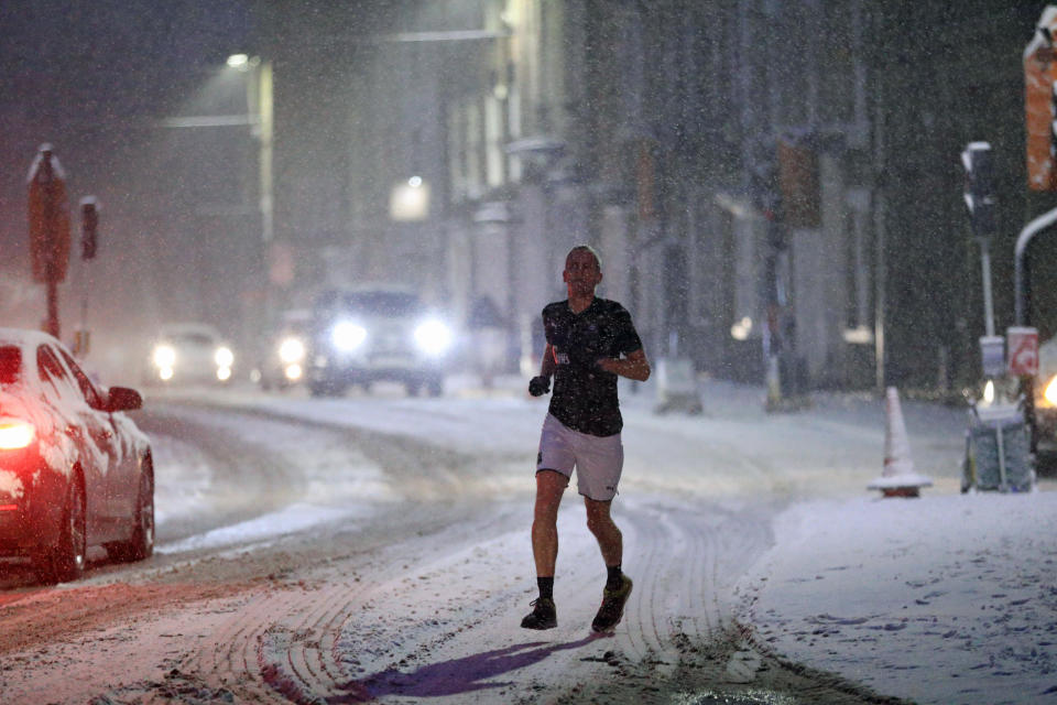 Snowfall didn't stop one jogger taking to the streets of Knaresborough, North Yorkshire.