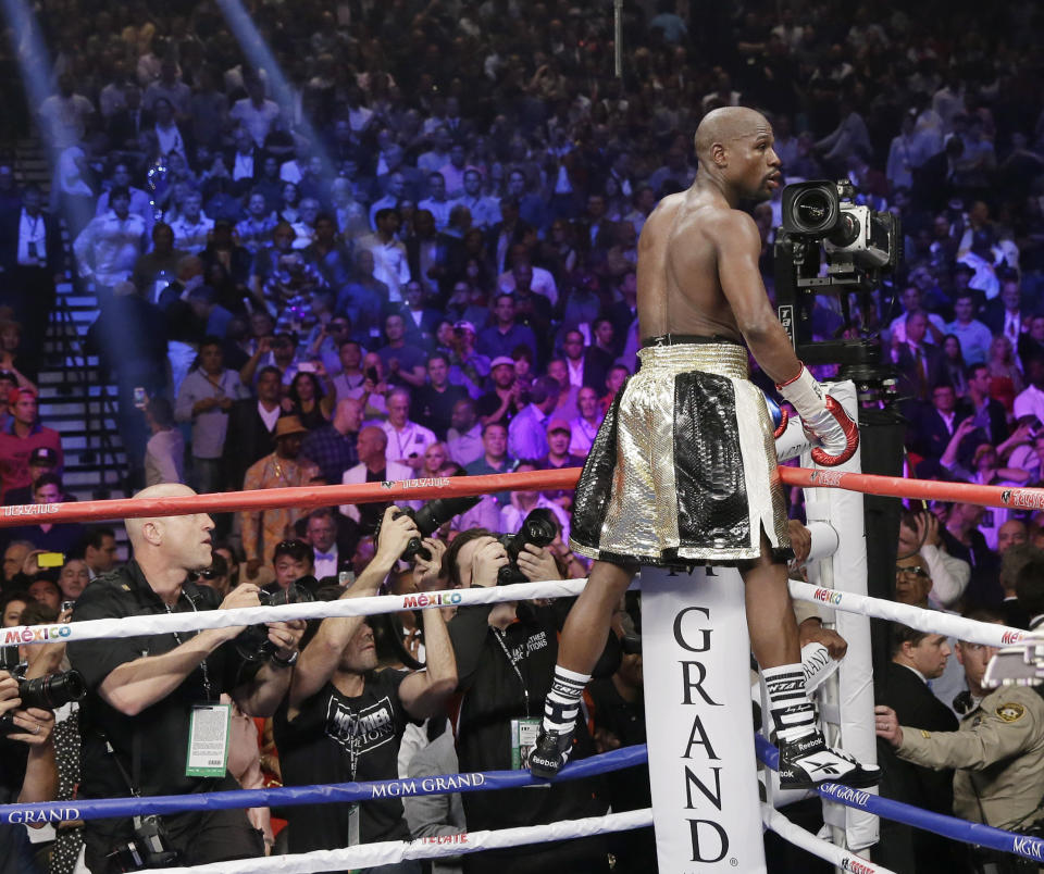 Floyd Mayweather Jr., reacts on his corner after the welterweight title fight against  Manny Pacquiao, from the Philippines, on Saturday, May 2, 2015 in Las Vegas. (AP Photo/Isaac Brekken)