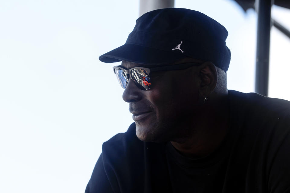 Co-Owner Michael Jordan, of 23XII Racing, sits in his pit box during a NASCAR Cup Series auto race at Talladega Superspeedway, Sunday, Oct. 6, 2024, in Talladega, Ala. (AP Photo/ Butch Dill)