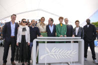 Jury president Vincent Lindon, center, poses with jury members Jeff Nichols, from left, Noomi Rapace, Asghar Farhadi, Deepika Padukone, Rebecca Hall, Joachim Trier, Jasmine Trinca, and Ladj Ly at the photo call for the jury at the 75th international film festival, Cannes, southern France, Tuesday, May 17, 2022. (AP Photo/Daniel Cole)