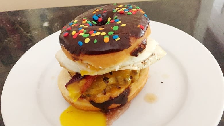 Donut breakfast burger on plate